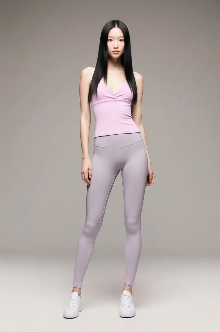 Mei wearing the Halter Padded Crop Tank – Black Market